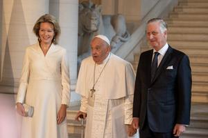 Pope Francis arrives at Laeken Castle in Belgium on Sept. 27, where he is greeted by the Belgian royal family, Queen Mathilde and King Philippe.