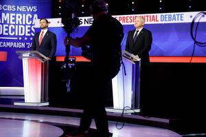 L to R: Republican vice-presidential candidate Sen. JD Vance of Ohio and Democratic vice-presidential candidate Minnesota Gov. Tim Walz participate in a debate at the CBS Broadcast Center on Oct. 1 in New York City. 