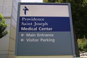 A sign for the Providence St. Joseph Medical Center is on display near the hospital in Burbank, California. 