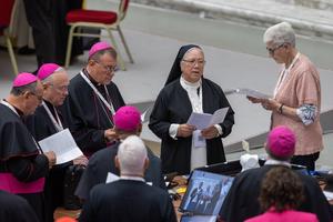 Attendees pray together on Oct. 2, as the 2024 session of the Synod on Synodality gets underway. 
