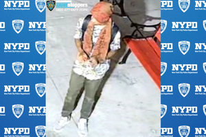 The suspect who allegedly vandalized statues at the St. Therese of Lisieux Roman Catholic Church in Brooklyn is seen in footage on Tuesday, Oct. 22, 2024.