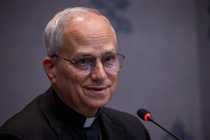 Cardinal Robert Prevost speaks to members of the media during a Synod on Synodality briefing on Oct. 23, 2024, at the Vatican.