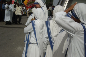Missionaries of Charity during a religious procession in the streets of Port-au-Prince, Haiti.