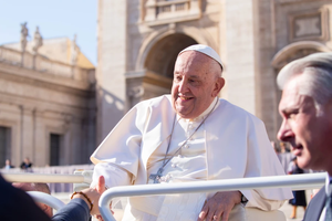 Pope Francis shakes hands with pilgrims gathered in St. Peter’s Square for his Wednesday general audience on Nov. 6, 2024, at the Vatican.
