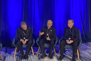 USCCB president Archbishop Timothy Broglio (left); Bishop Mark Seitz, head of the USCCB migration committee (center); and Bishop Michael Burbidge, chairman of the USCCB’s pro-life committee, speak to media at the USCCB fall plenary assembly on Nov. 12, 2024.
