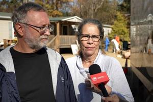 Dwayne and Jeneal Hensley, who lost their home, have sought solace in prayer.