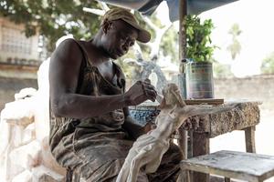 Anthony Agasi works on a figurine representing Jesus Christ at his workshop in Onitsha, Nigeria, on Feb. 28, 2023. Agasi has kept up his familial tradition for the last 35 years, following in the footsteps of his father and grandfather. Some statues can take up to a month to finish. He sells them to churches and individuals. Catholicism was first introduced in Southeast Nigeria by missionaries in the 1880s, until becoming the main faith, though Nigeria have seen an increase in Christian persecution and oppression in recent years.