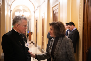 Archbishop Timothy Broglio speaks with Rep. Nancy Pelosi after a Mass held at the U.S. Capitol on Dec. 12, 2024, the feast of Our Lady of Guadalupe.