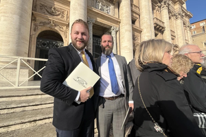 Catholic Land Movement co-founders Andrew Ewell (top left) and Michael Guidice (top right), pictured here on the steps of St. Peter’s Basilica.
