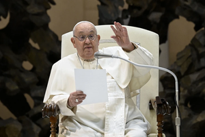 Pope Francis waves to pilgrims gathered for his general audience on Wednesday, Jan. 8, 2025, in Paul VI Hall at the Vatican.