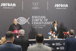 The papal ambassador to Jordan, Archbishop Giovanni Pietro Dal Toso, and Jordanian Minister of Tourism and Antiquities Lina Annab speak at a press conference in Amman, Jordan, about the new exhibit “Jordan: Dawn of Christianity,” which will open at the Vatican on Jan. 31, 2025.