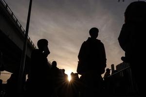 Asylum seekers wait for their CBP One appointments with U.S. authorities before crossing through El Chaparral port in Tijuana, Baja California state, Mexico, on Jan. 20, 2025. 