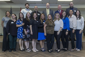 The first round of graduates of the Catholic Educational Leadership Cohort pictured with Superintendent Jim Rigg (back, middle) and David Armstrong (back, right) at graduation celebration on Jan. 10, 2025.