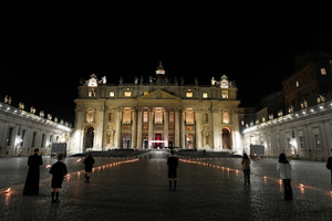 A candlelight Stations of the Cross in St. Peter’s Square on Good Friday 2021.