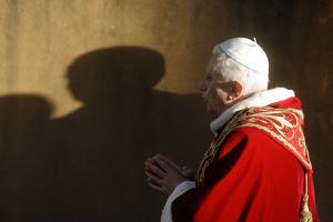 Pope Benedict XVI walks into Santa Sabina Church to celebrate Ash Wednesday on March 1, 2006 in Rome, Italy.