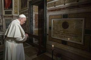 Pope Francis prays near the tomb of Jesuit Father Pedro Arrupe, superior general of the Society of Jesus between 1965 and 1981, during a Mass at the Jesuit Church of the Most Holy Name of Jesus, known as the “Gesu” in Rome, Italy, on March 12, 2022, on the 400th anniversary of the canonization of St. Ignatius of Loyola, the society’s founder.