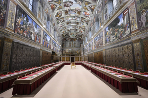 Long tables at the Sistine Chapel await the arrival of cardinals for the conclave to elect the next pope, Tuesday, May 6, 2025.