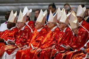 Members of the College of Cardinals attend the Pro Eligendo Mass Wednesday morning in St. Peter’s Basilica.