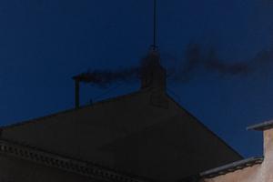 Black smoke billows from the chimney of the Sistine Chapel, where 133 cardinals are gathering on the first day of the conclave, indicating that a successor of late Pope Francis was not elected, Wednesday, May 7, 2025.