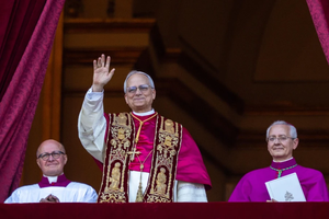 Pope Leo XIV waves to pilgrims in St. Pete’s Square shortly after his election on Thursday, May 8, 2025.