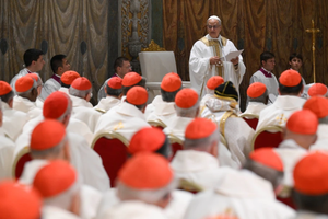 Pope Leo XIV addresses cardinals in the Sistine Chapel during his first Mass as pope on Friday, May 9, 2025.