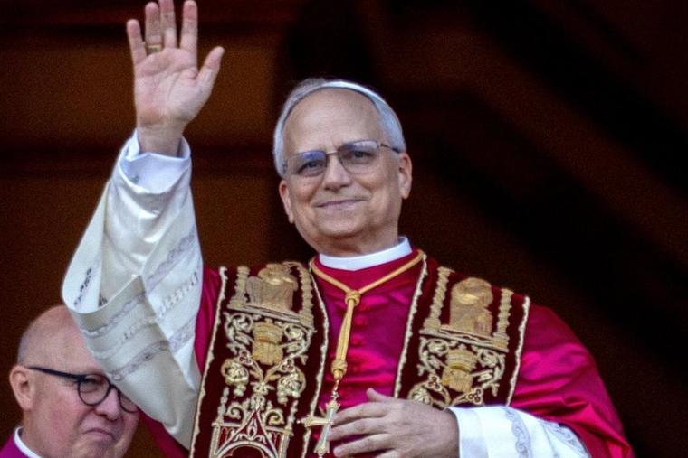 Pope Leo XIV greets the faithful waiting in St. Peter's Square on the historic day of his elevation to Supreme Pontiff of the Roman Catholic Church on May 9, 2025.