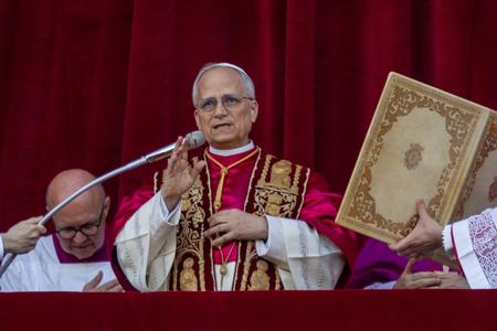 Pope Leo XIV came out May 8, 2025, to the balcony of the Sistine Chapel wearing the traditional garb for a new pope, a red mozzetta and a stole over a white rochet and his new white cassock.