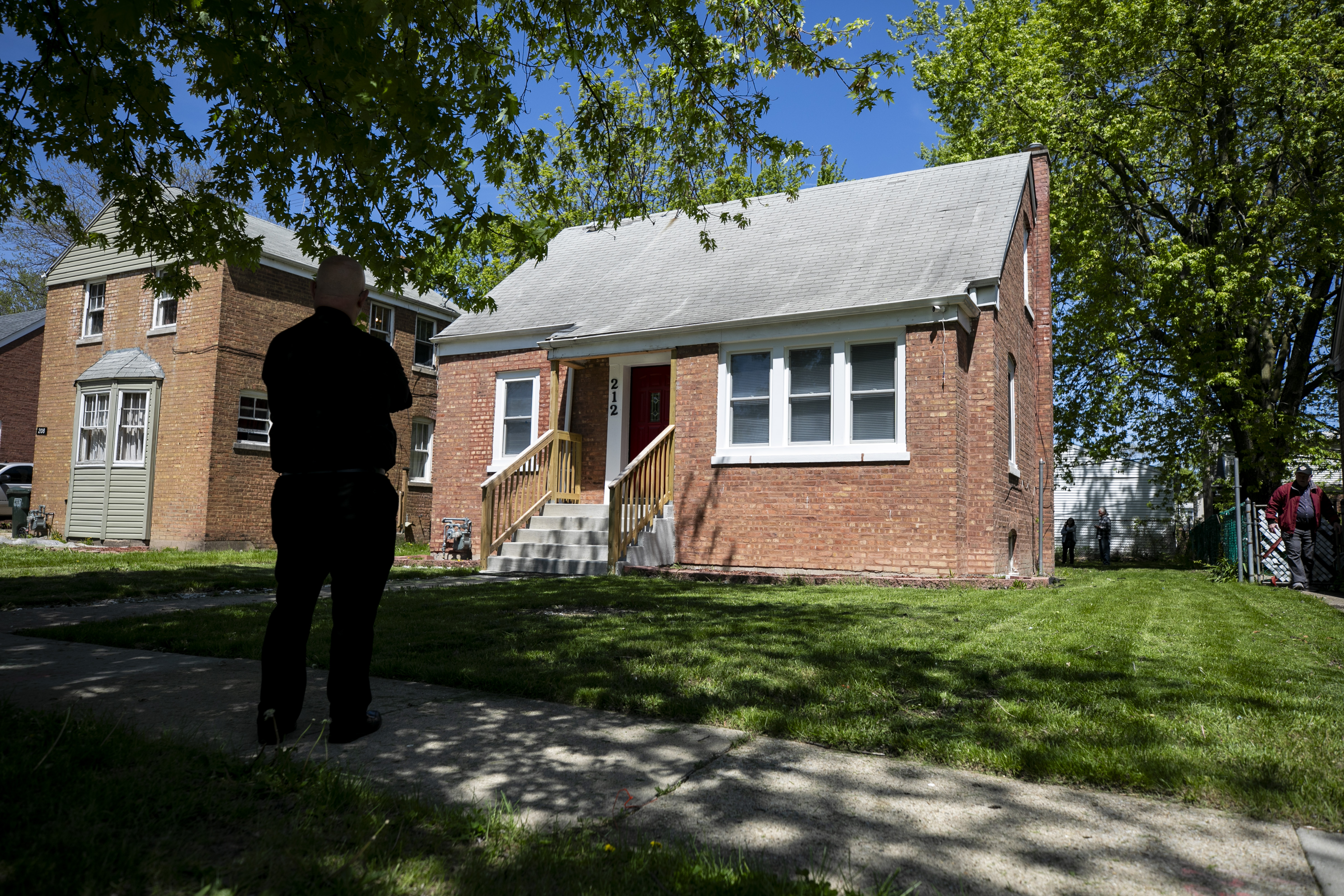 A Catholic priest from Indiana stands outside the childhood home of Pope Leo XIV the day after he was in Dolton, on Friday May 9, 2025. (Photo by Vincent D. Johnson/for The National Catholic Register)