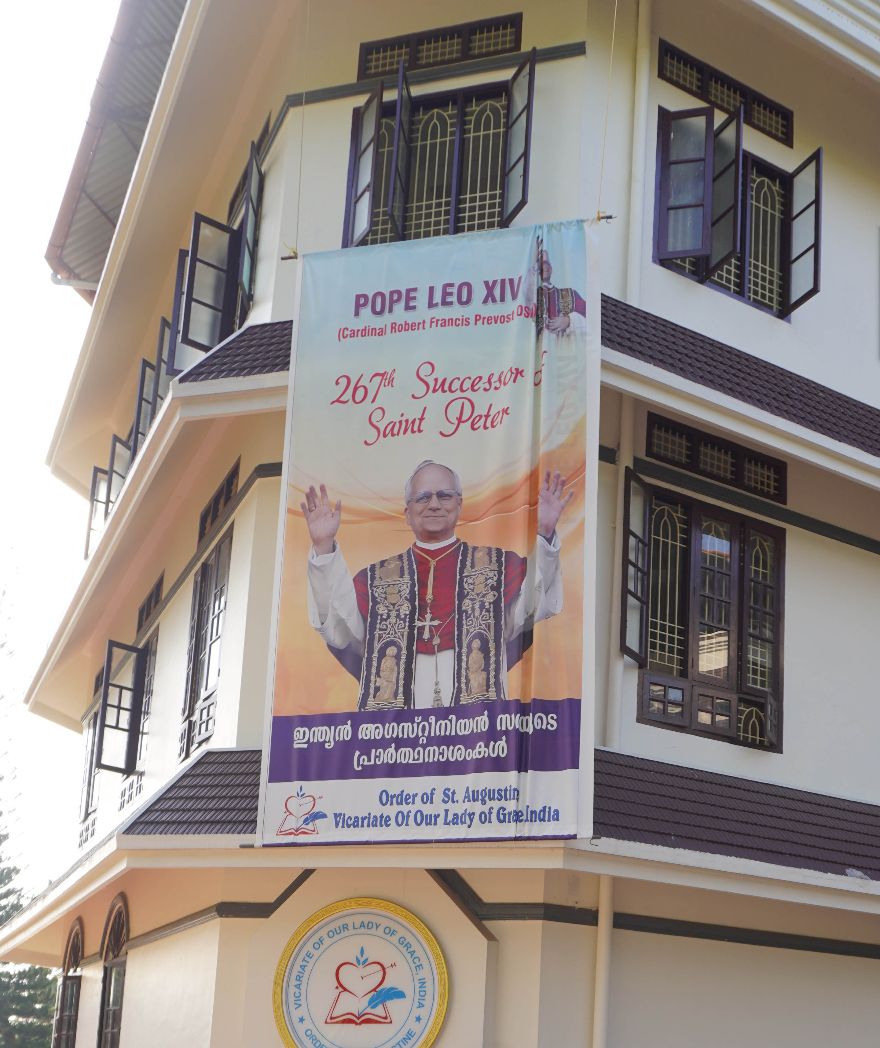 Huge flex portrait of Pope Leo XIV hung on the Augustinian provincail house at Aluva near Kochi (1)