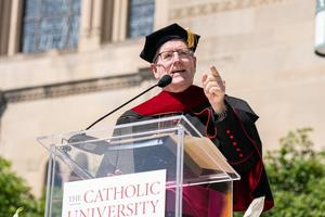 Bishop Robert Barron addresses graduates and their families at The Catholic University of America on May 17, 2025, for the 2025 commencement address.