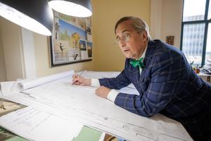 Duncan Stroik, a leading figure of the traditional sacred architecture revival in the U.S., leans over his firm’s latest project, a 33-room retreat house for the Shrine of Our Lady of Guadalupe in La Crosse, Wisconsin. 
