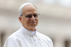 Pope Leo XIV smiles during his first general audience in St. Peter's Square on May 21, 2025.