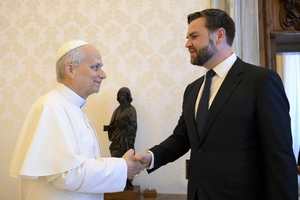 Pope Leo XIV shakes hands with U.S. President JD Vance in the papal library. The two had a private meeting before they were joined by U.S. Secretary of State Marco Rubio on May 19, 2025.