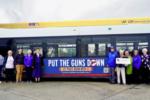 The Sisters of Bon Secours along with seven local Catholic congregations are launching a citywide advertisement campaign against gun violence in Baltimore. The ad features the message “Put the Guns Down, Let Peace Begin with Us” and a QR code linking to the campaign webpage.