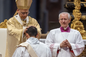 Pope Leo XIV lays hands on one of 11 men during priestly ordinations at St. Peter's Basilica on May 31, 2025. 