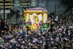 The miraculous image of Jesus Nazareno making its way through the streets of Manila, surrounded by thousands of devotees during the Traslacion procession celebrated annually on January 9,