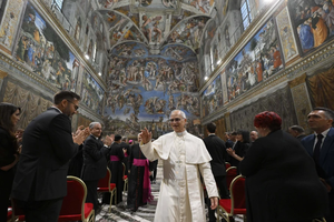 Pope Leo XIV exits the Sistine Chapel following a June 2, 2025, ceremony commemorating the life and legacy of Blessed Iuliu Hossu.