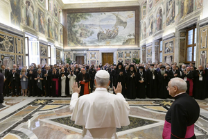 Pope Leo XIV greets participants of a symposium in Rome, Saturday, June 7, 2025.