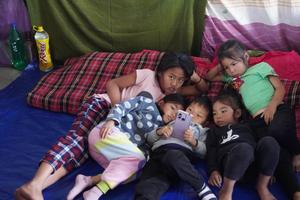 Children of families that fled to Churuchandpur at a Catholic refugee camp in December 2023.