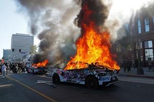Waymo cars are set on fire and vandalized during a protest against immigration raids on June 8, 2025, in Los Angeles. 