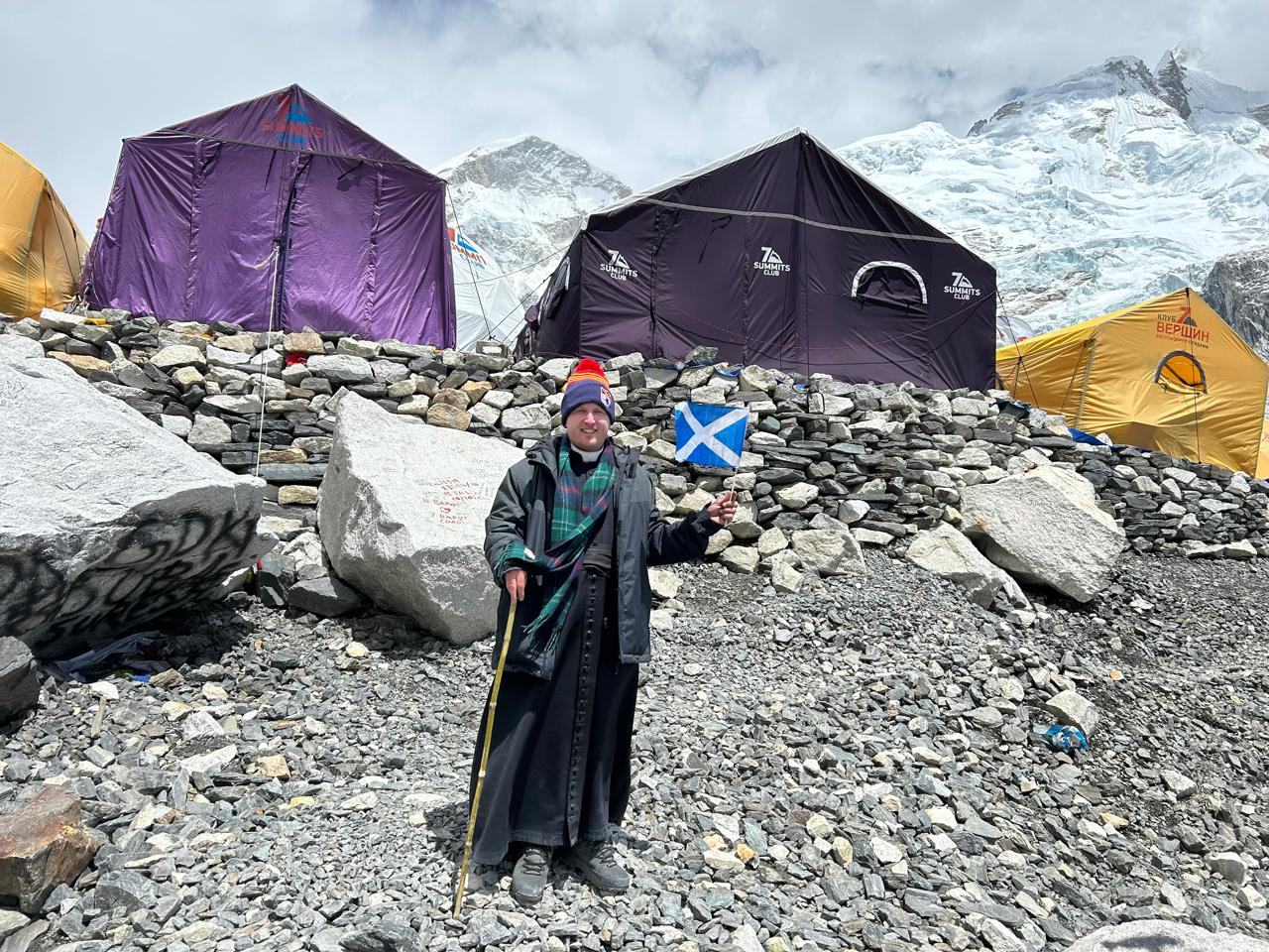 Father Ninian Doohan poses for a photo during the journey. 