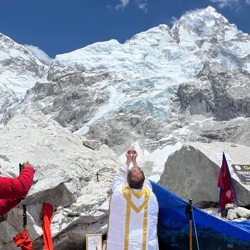 Holy Mass offered for Peace at Everest Base Camp (5364 meters, 17,598 feet), 12 Noon Wednesday 14th May AD 2025 (Sagaramatha - Mount Everest - is visible here only as the snow-smoke cloud on the top left).