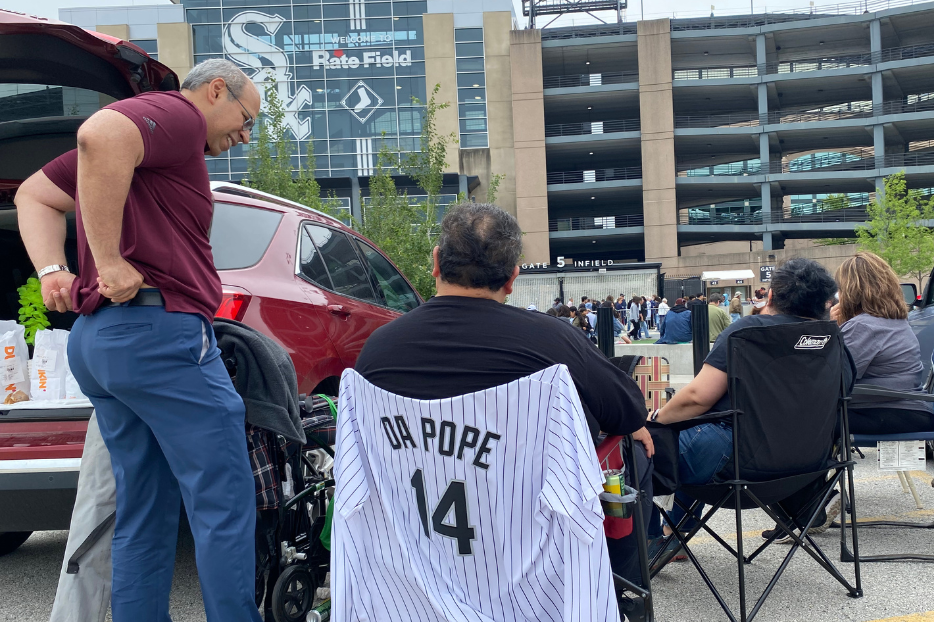 A celebration of Pope Leo XIV at Rate Field brought together baseball and Catholicism, as some attendees tailgated in the stadium parking lot before the official programming began. Photo by Jonathan Liedl/National Catholic Register