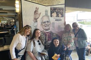 Fans of the Chicago White Sox — and Pope Leo XIV — lined up on June 14, 2025, to take photos of themselves in front of a display the White Sox created at Rate Field commemorating then-Father Robert Prevost’s attendance of the team’s World Series game in 2005.