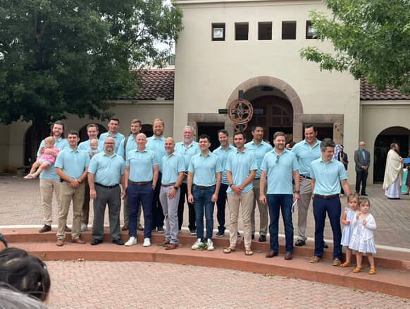 Just a few of the many dads who came to church on Trinity Sunday wearing the same polo.