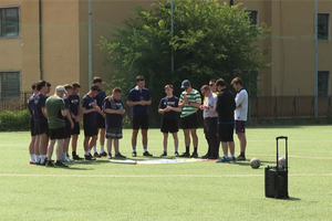 Athletes pray before a match organized by the Caritas Cup in Rome, Saturday, June 14, 2025.