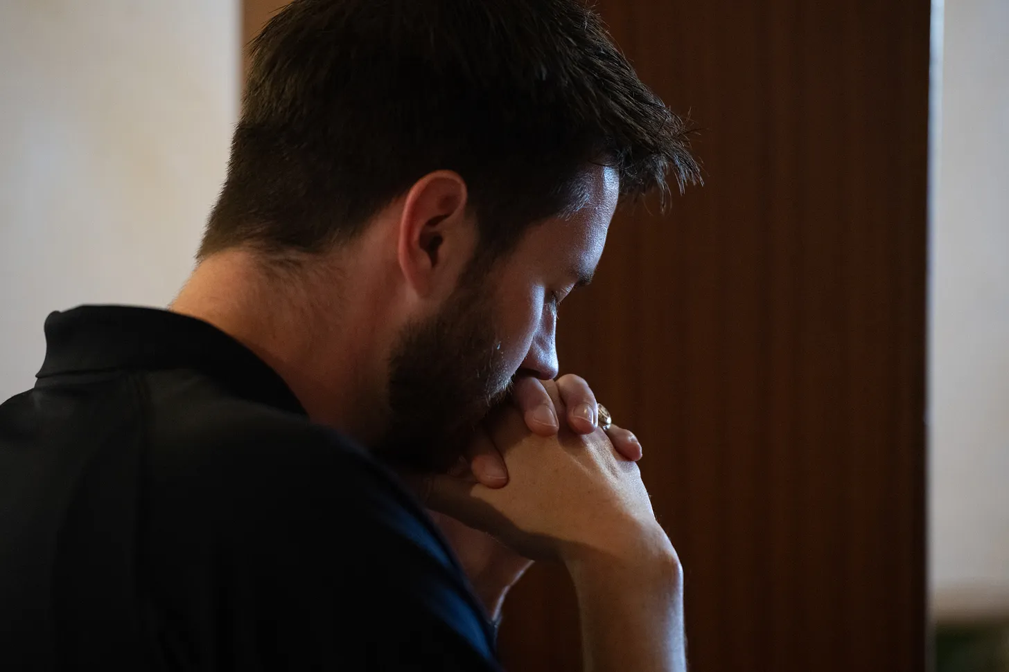 Charlie, a Perpetual Pilgrim with the Drexel Route, bows his head in deep prayer during a moment of Adoration at Sacred Heart Church in Palm Desert.