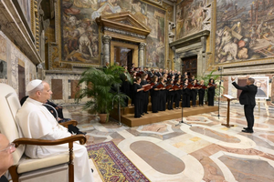 Pope Leo XIV listens to the choir during an audience with participants of an event organized by the Domenico Bartolucci Foundation on June 18, 2025.