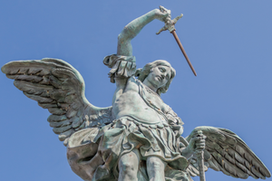 A statue of St. Michael the Archangel putting his sword back into its sheath is seen atop Castel Sant’Angelo in Rome.