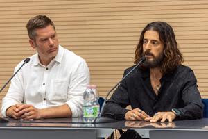 Director Dallas Jenkins (left) and Jonathan Roumie, who plays Jesus in the wildly successful TV series “The Chosen,” speak with journalists during a press conference on June 23, 2025, at the Vatican.